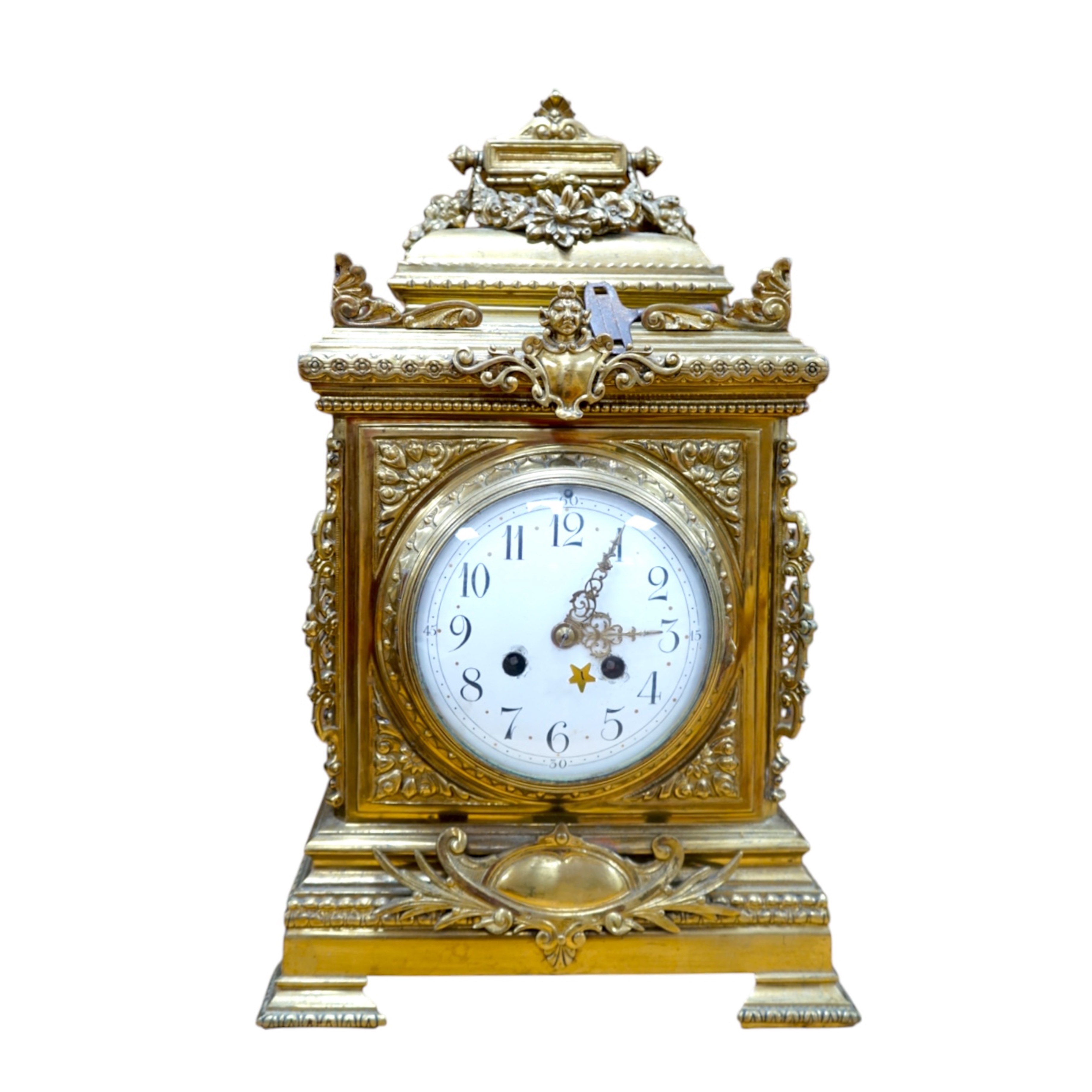 A Louis XVI style ormolu mantel clock with enamel dial, key and pendulum, 42cm. Condition - fair to good